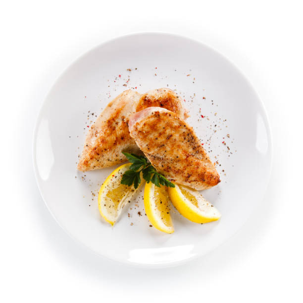 istock Grilled chicken breast and vegetables 825461100