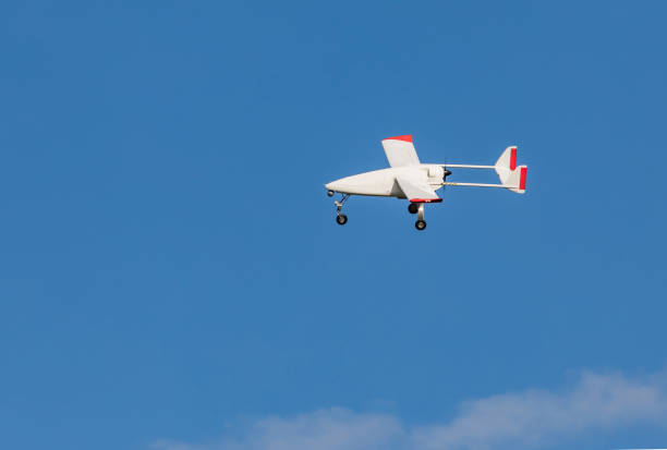 istock Unmanned aerial vehicle (UAV) in blue sky. 825461870
