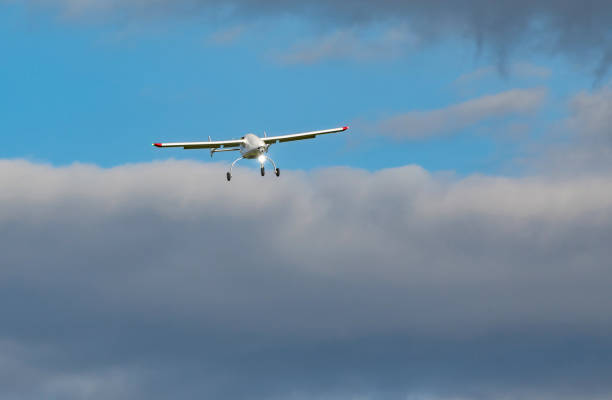 istock Unmanned aerial vehicle (UAV) in blue sky. 825461876