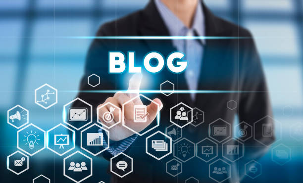 istock Businessman hand chooses blog wording on interface screen. internet technology concept. can used for cover page presentation and web banner. 825464090