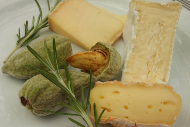 istock Plate of cheeses in serving Fresh almonds 825478686
