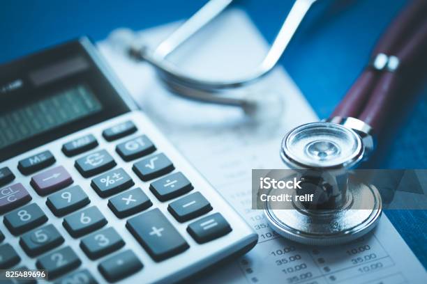 Stethoscope And Calculator Concept Stock Photo - Download Image Now - Healthcare And Medicine, Financial Bill, Doctor