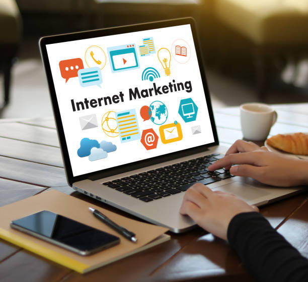 istock IOT business man hand working and internet of things (IoT) word diagram as concept use Browsing Internet computer Searching Data Internet Marketing 825498728