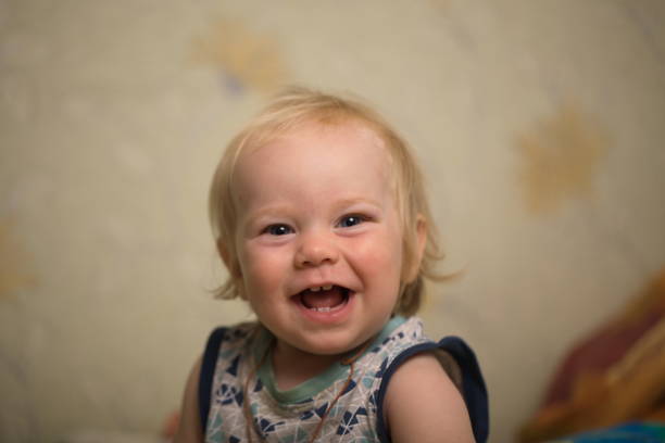 istock The baby woke up in bed 825499568
