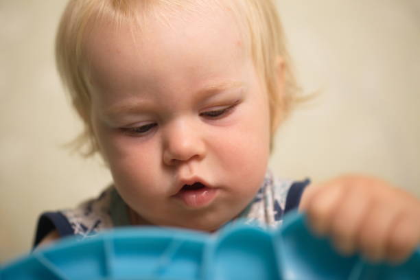istock The baby woke up in bed 825500928