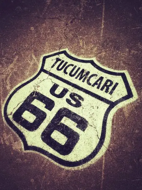 Route 66 sign painted on the road in Tucumcari