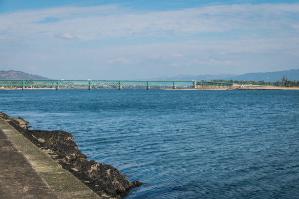 istock Panorama of the the Eiffel Bridge, designed by Gustave Eiffel and Lima river in Viana do Castelo, Portugal. 825522834