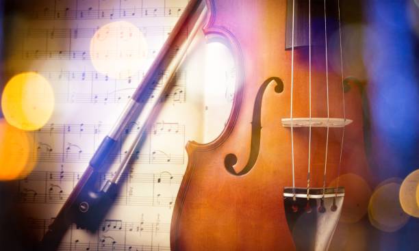 Music. Close-up Photo Of Violin And Musical Notes symphony orchestra photos stock pictures, royalty-free photos & images