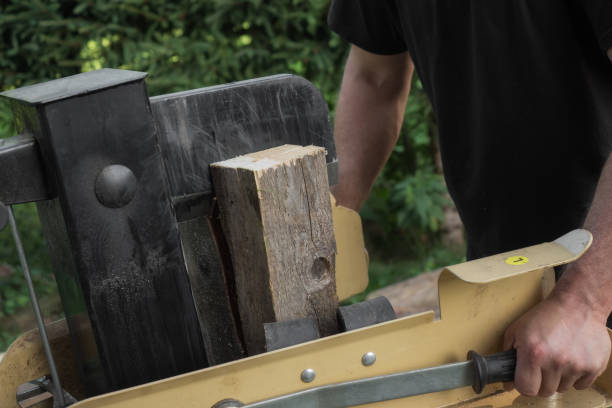 istock Firewood split with wooden splitter 825525932