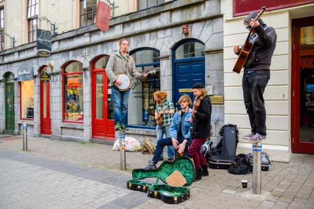 Galway, Ireland. 4th April, 2017: irish people playing music at galway streets