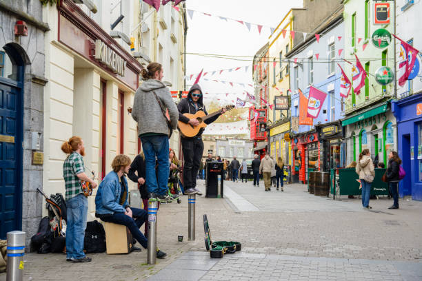 Galway, Ireland. 4th April, 2017: irish people playing music at galway streets