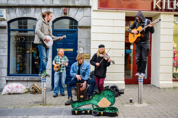 Galway, Ireland. 4th April, 2017: irish people playing music at galway streets