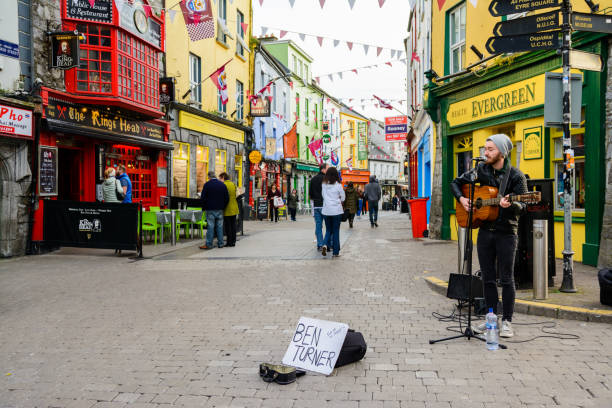 Galway, Ireland. 4th April, 2017:  irish people playing music at galway streets