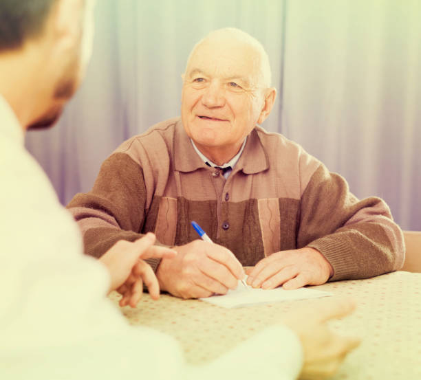 istock Retired and social employee fill form 825526688