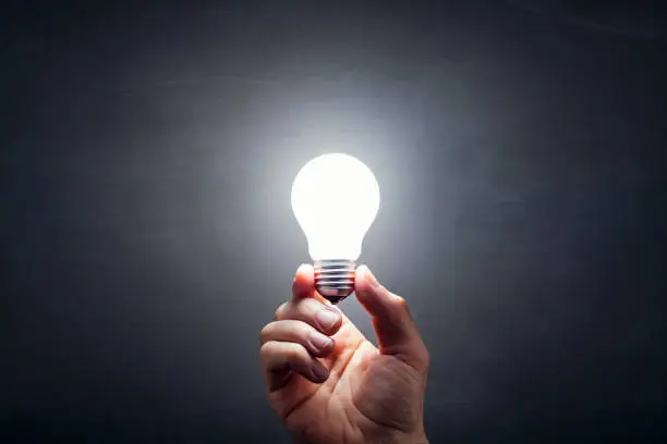 Photo of Inspiration - Light Bulb Hand Idea Blackboard