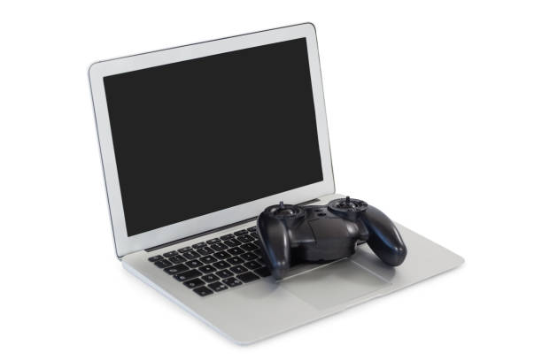 istock Joystick and laptop on white background 825528072