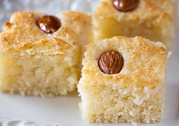 istock Three pieces Basbousa (namoora) traditional arabic semolina cake 825538958