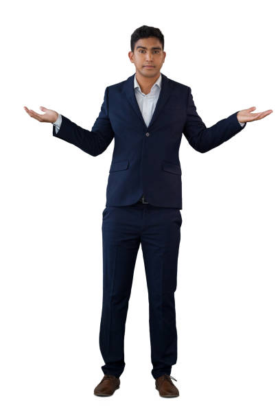 istock Portrait of businessman gesturing while wearing suit 825546794