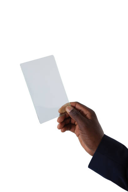 istock Businessman holding a glass smartphone 825549514