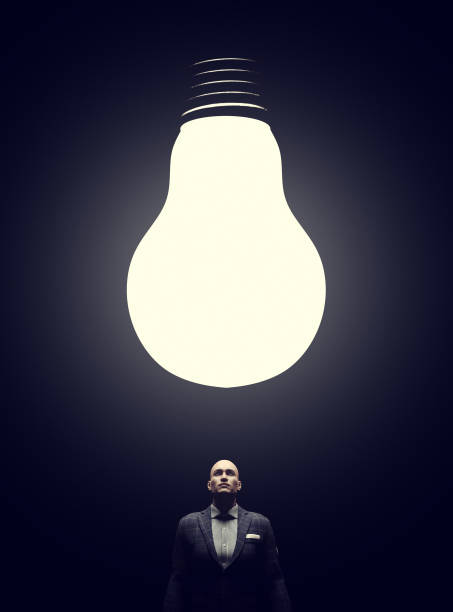 istock Man with a big bulb above his head 825550774