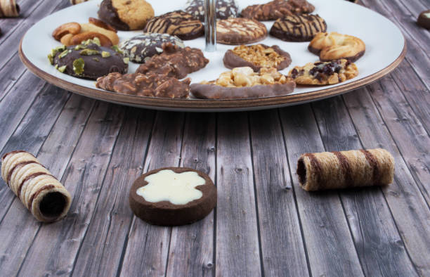 istock Dark vintage background with various homemade cookies. 825551004