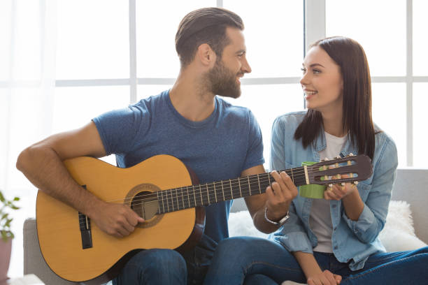 istock Young couple moving to a new apartment together relocation 825554444