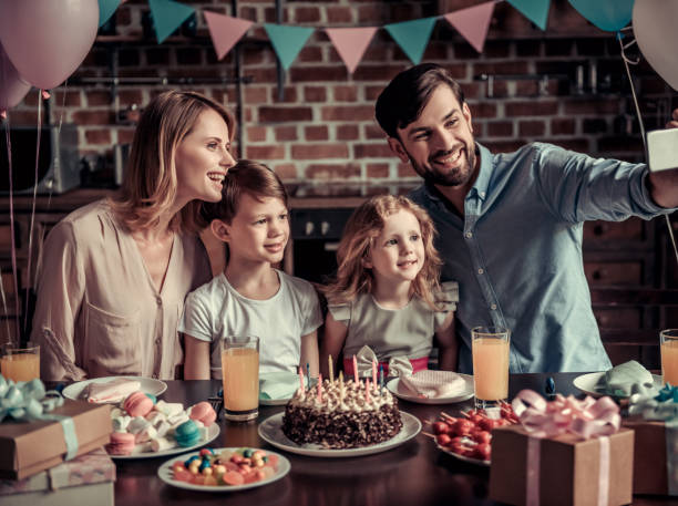 istock Family celebrating birthday 825554628