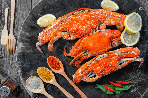 istock jumbo crab and spices herb on dark background 825555006