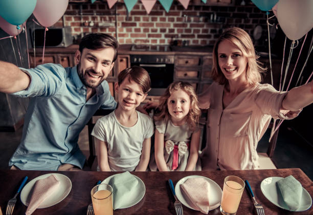 istock Family celebrating birthday 825558280