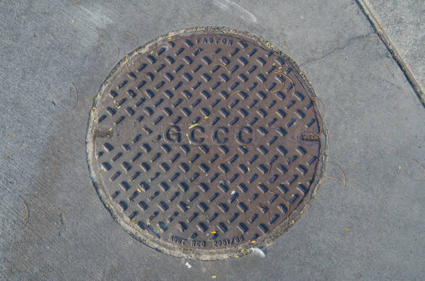Close-up of a manhole cover in Leith, to the north of central Edinburgh, Scotland.