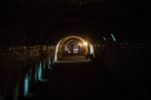 istock blur shot, light at the end of tunnel 825558828