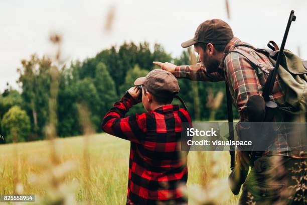 Father And Son Hunting For Boar Stock Photo - Download Image Now - Hunting - Sport, Hunter, Father