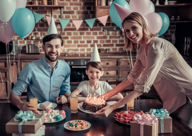 istock Family celebrating birthday 825559332