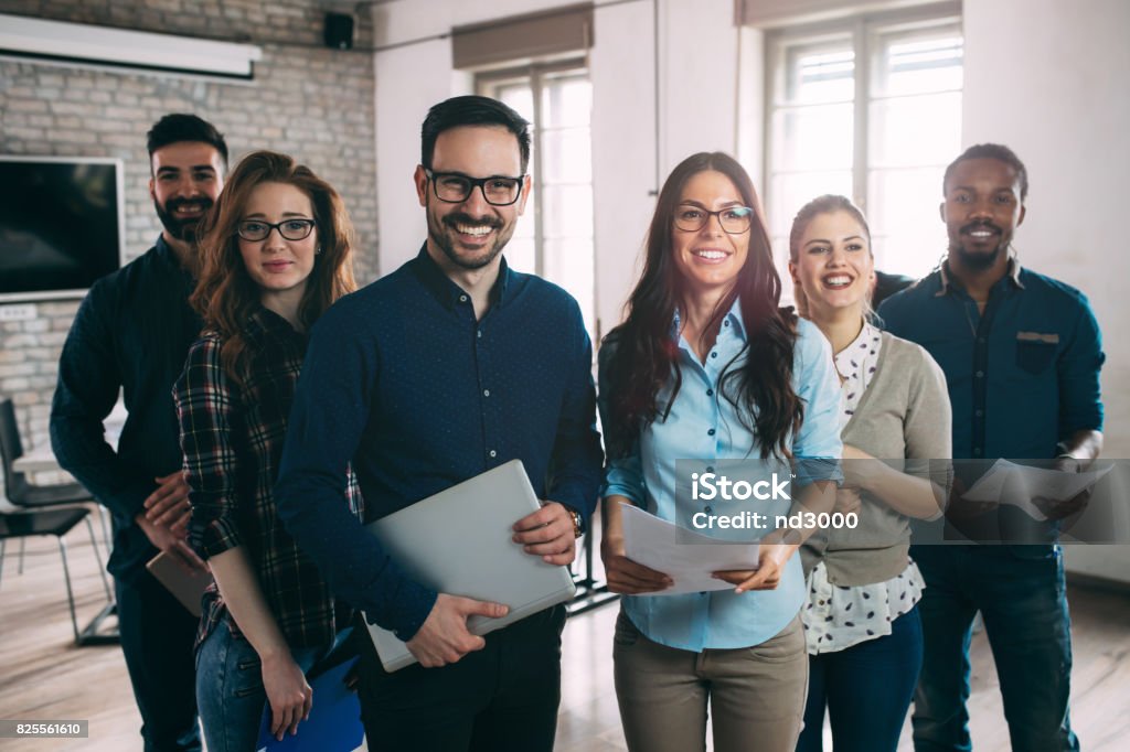 Successful company with happy workers Successful company with happy employees in modern office Teamwork Stock Photo