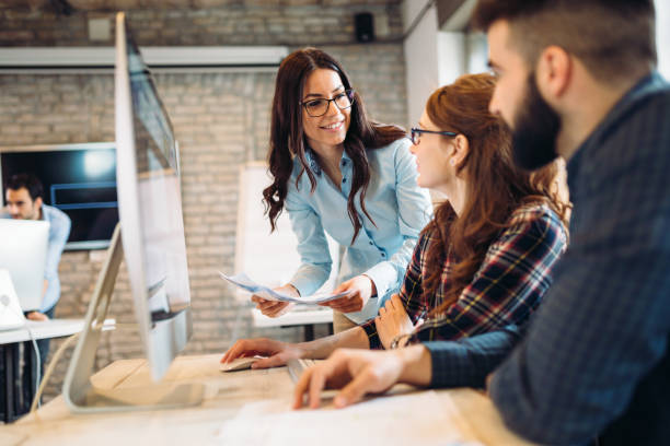 istock Company coworkers discussing ideas and brainstorming 825561630