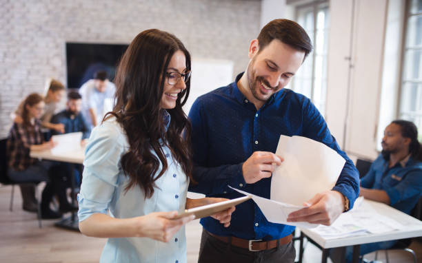 istock Company coworkers discussing ideas and brainstorming 825561732