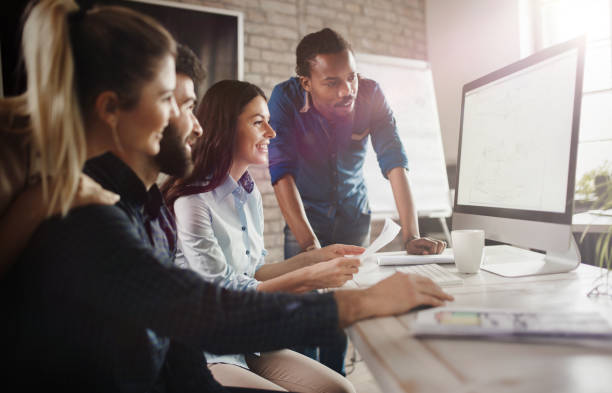 istock Company employees working in office 825561860