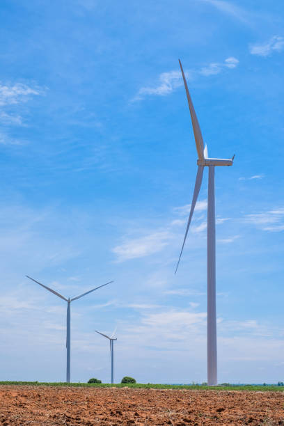 istock Wind turbine power at daylight 825563014