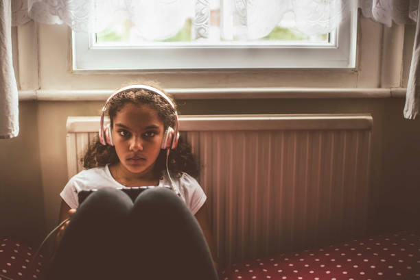 istock Child (11-12) Listening to Music 825566622