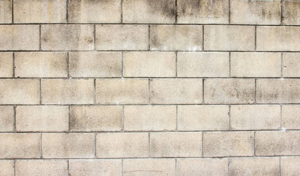 istock Concrete block wall seamless background and texture 825576940