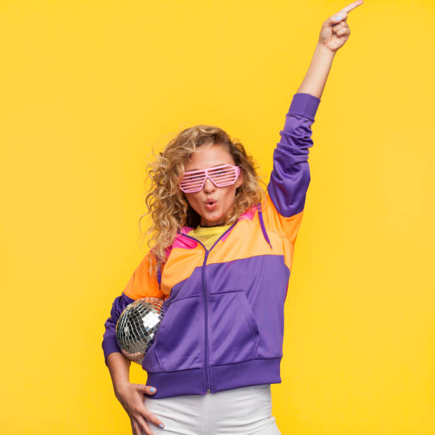 istock Stylish woman with disco ball 825576990