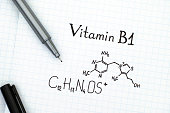 Chemical formula of Vitamin B1 with black pen.