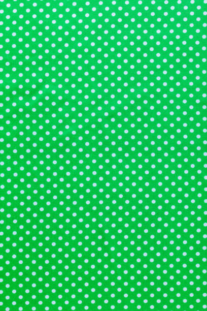 istock Green polka-dot cotton print top view 825584260