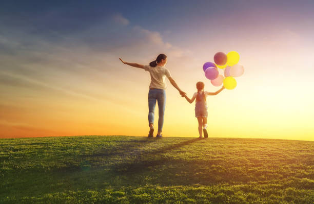 istock family having fun on nature 825584322