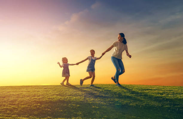 istock family having fun on nature 825584334