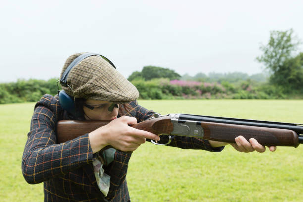 istock Country gal out shooting 825584388