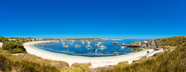 Dreamy Bay, white beach with boat and rocks, island in Indian Ocean, Rottnest Island, Australia, Western Australia, Down Under stock photo
