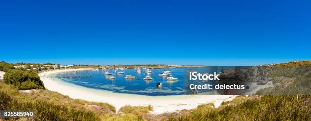 Dreamy Bay White Beach With Boat And Rocks Island In Indian Ocean Rottnest Island Australia Western Australia Down Under Stock Photo - Download Image Now