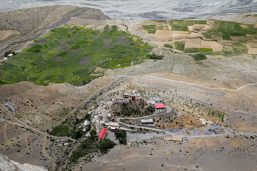 Aerial view of monastery and patchwork landscape