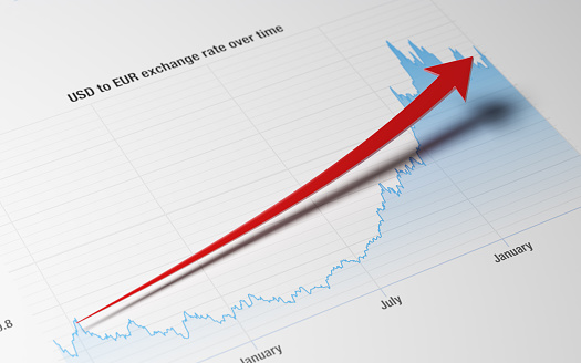 High quality 3d render of a red arrow demonstrating growth in revenue on a blue financial chart. Llit by the upper left corner of composition. Growth concept. Horizontal composition with copy space. Great use for business related concepts.